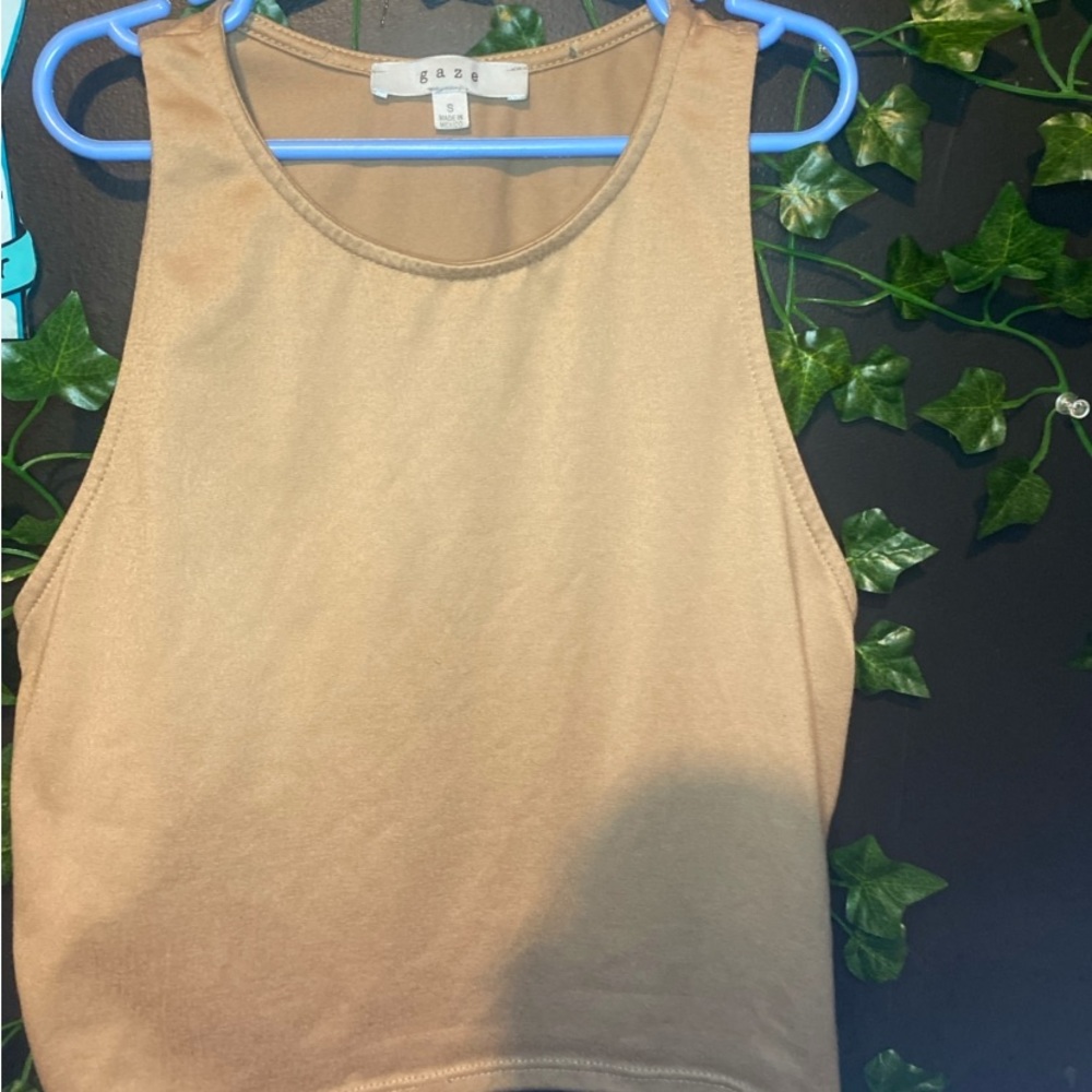It is a brown crop top